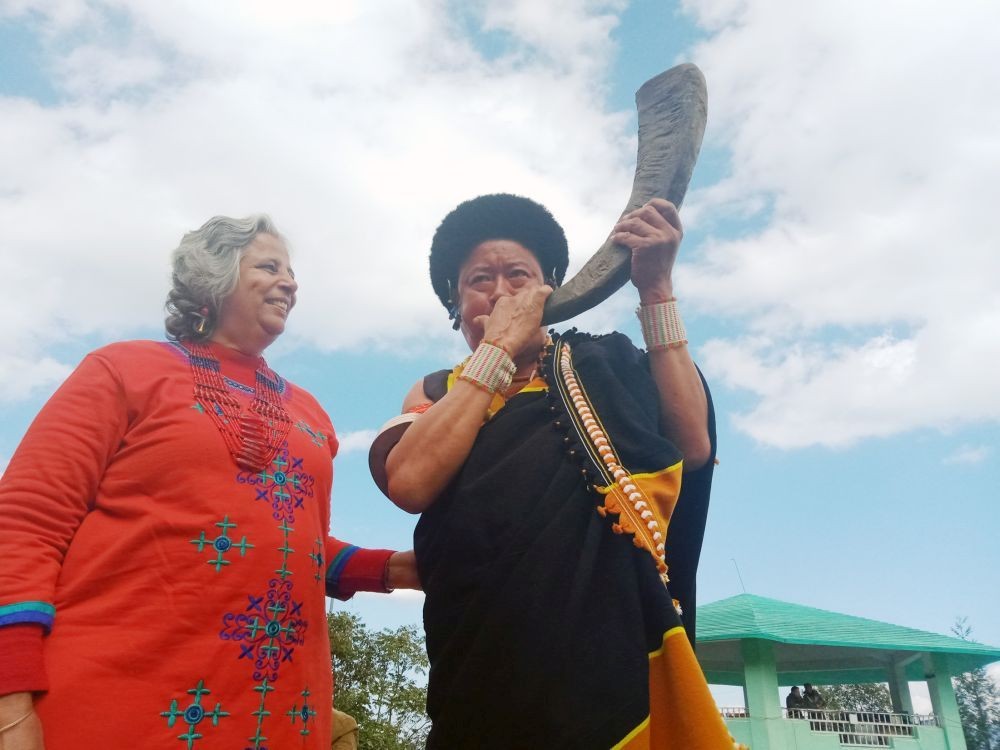 In this file photo taken December 3, 2019, a man plays a traditional Naga horn-pipe at the Naga Heritage Village, Kisama, the main venue of Nagaland’s Hornbill Festival. Held annually from December 1–10, the premier festival attracts the majority of tourists to the state. (Morung File Photo).